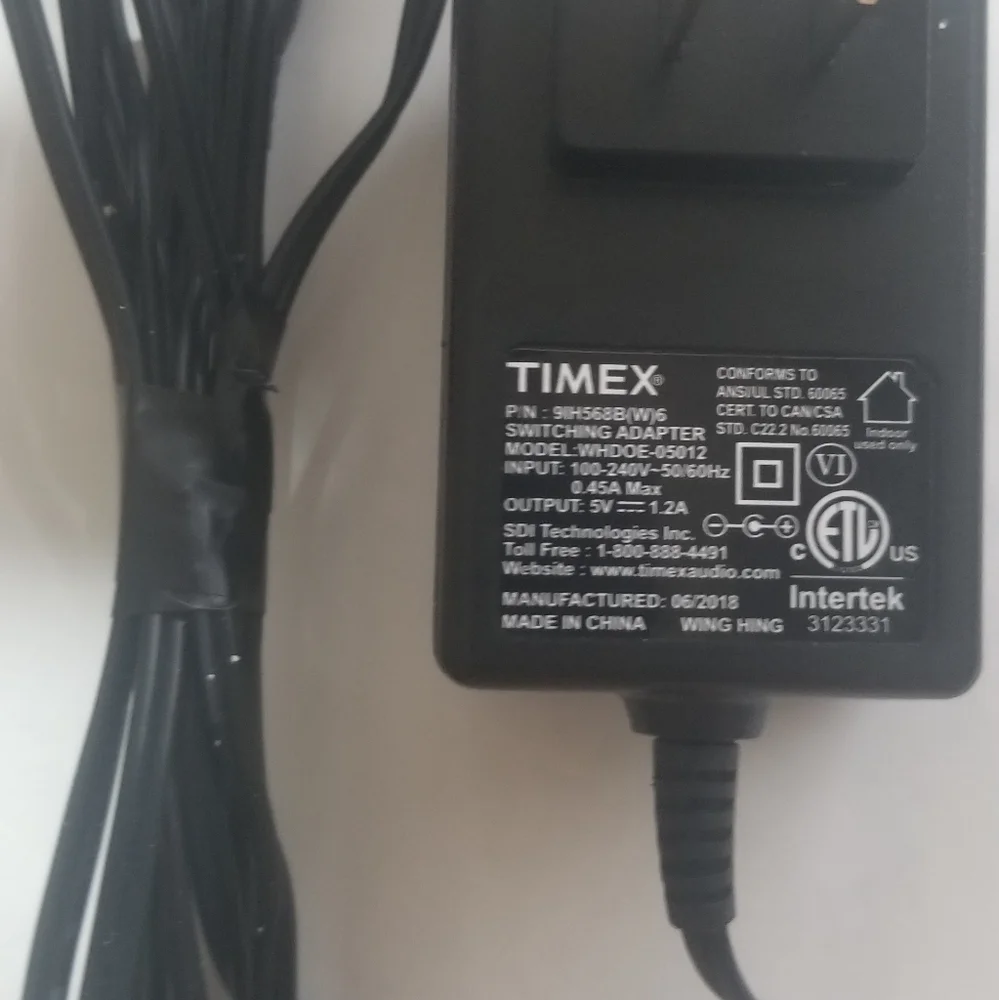 TIMEX Switching Adapter, P/N- 9IH568B(W)6. Model WHDOE-05012, 5V 1.2a